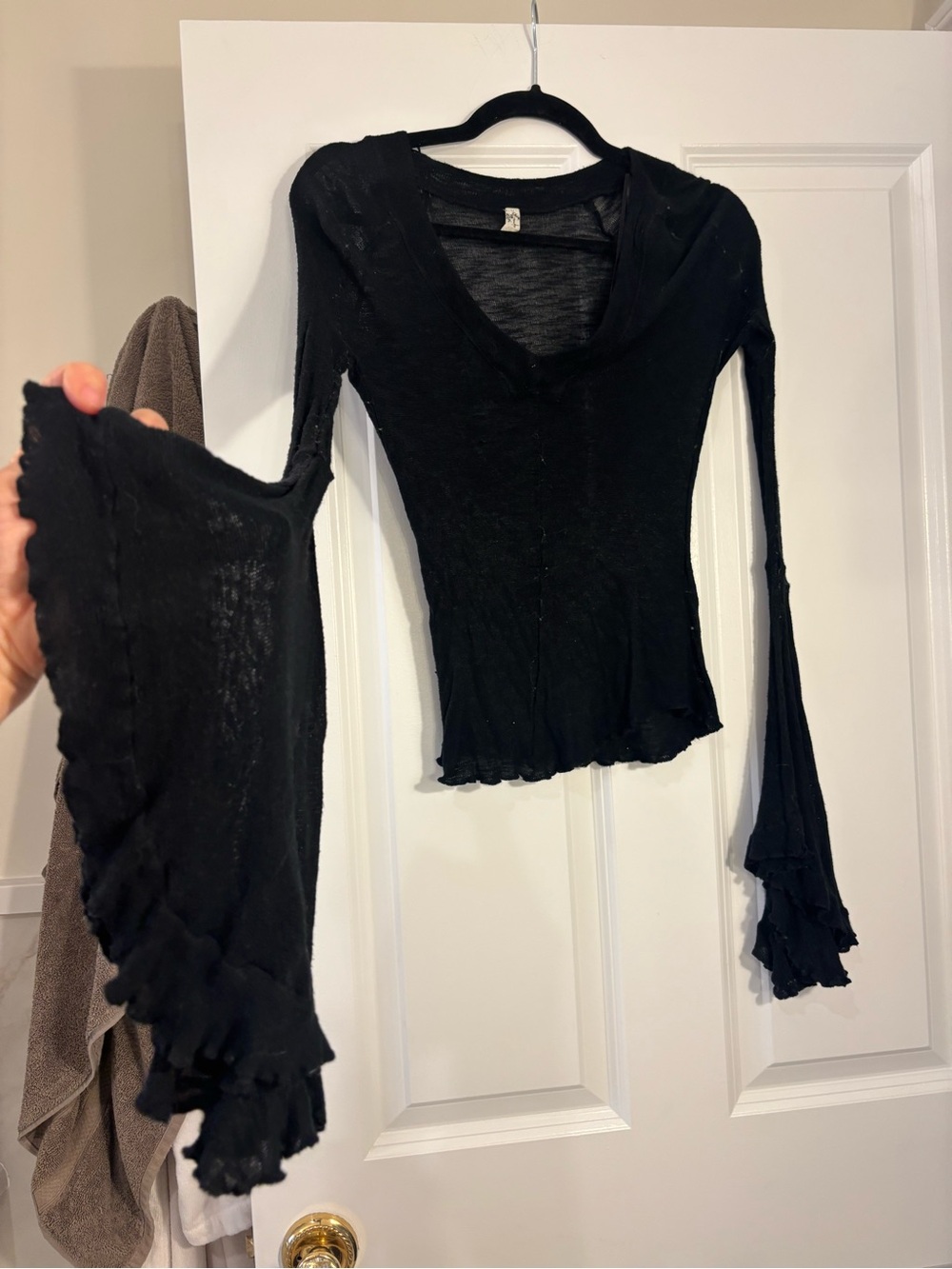 Black free people bell sleeve long sleeve top
